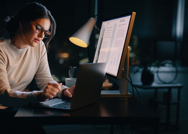 woman sitting at desk